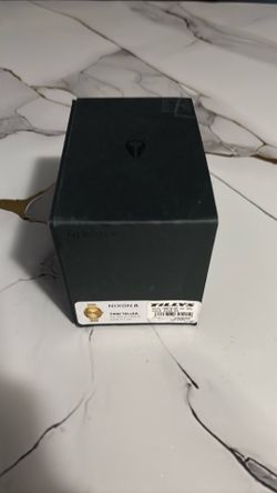 Gold Nixon watch
