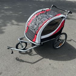 Brand new three and one double seated bicycle trailer, jogging stroller for children foldable collapsible worth 240