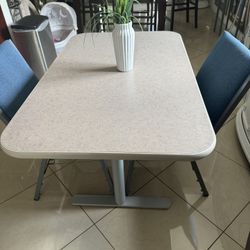 Heavy Duty Table 48” X30” And 29” High With 2 Metal Chairs In Good Condition 