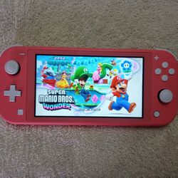 NINTENDO SWITCH LITE (MODDED) with 512GB and 125 SWITCH GAMES