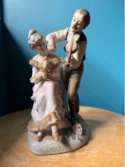 Victorian baroque-style romantic couple