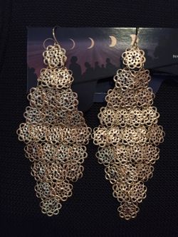 Pair of gold dangling earrings