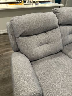 Power triple recliner.