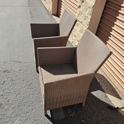 2 wicker patio chairs