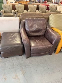 Nicoletti Italian leather armchair and foot stool (in store)
