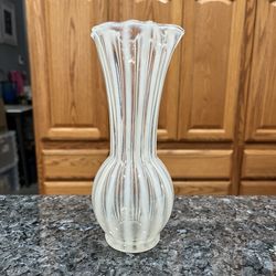 Glass Vase Clear with white .  Pretty design.  Size appropriately 7 1/2 inches tall.  Preowned.