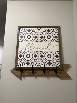 Coat hook and art work