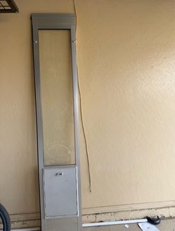 Dog door for sliding glass door
