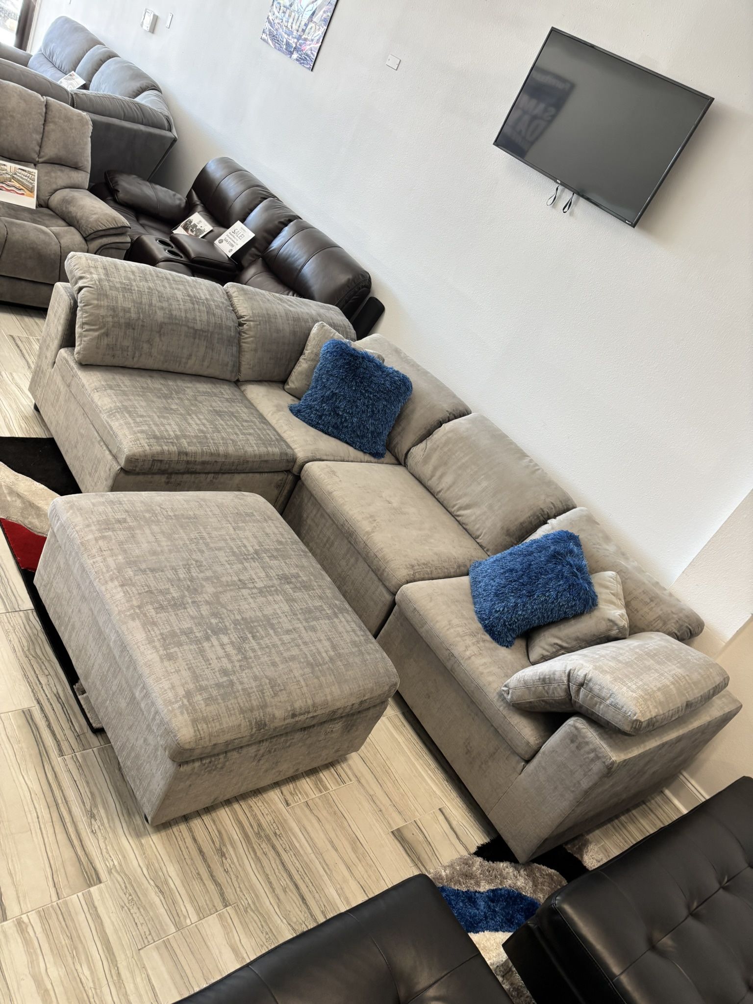Going out of business sale. Lima gray sectional with ottoman now $899. Easy finance option. Same day delivery.