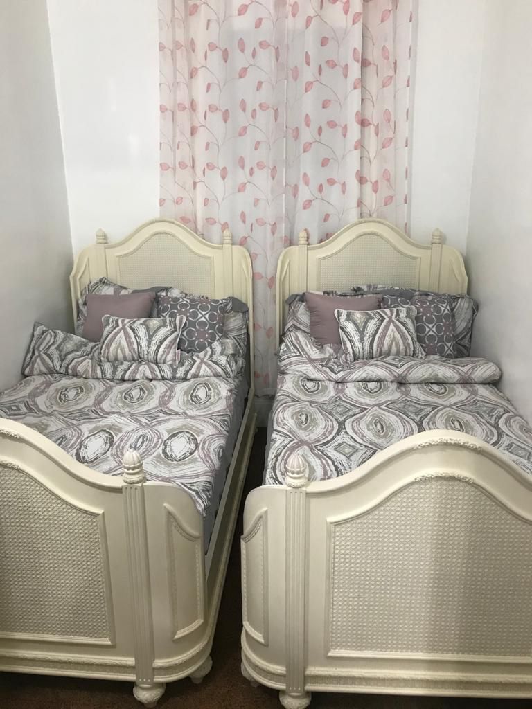 2 White Twin Beds 