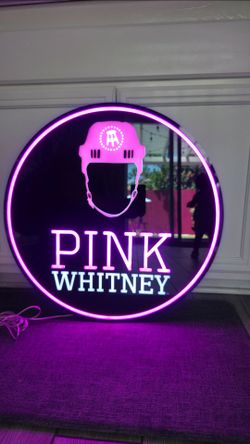 Pink Whitney neon sign