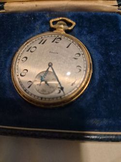 vintage dress-style Elgin open-face pocket watch