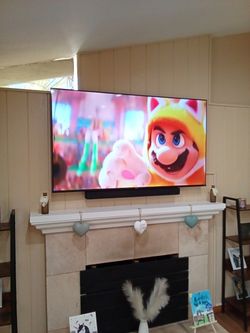 Hisense 65 Inches. UHD 4K With TV Wall Mount.