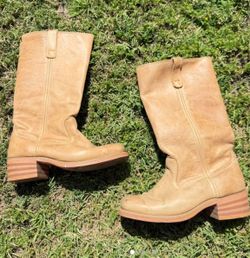 Frye look alike boots  - Genuine leather from the 70s  - small scratches on the front of the boots other than that they’re in very good condition  - o