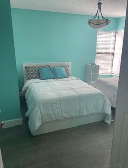 Two Full Size White Beds With Mattresses