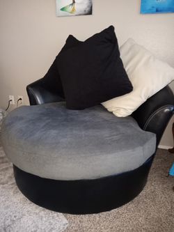 2 Leather Rotating Chairs 