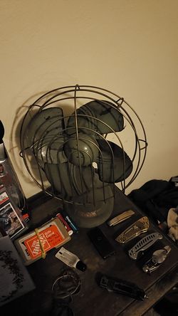 Antique dominion fan