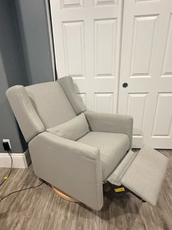 Crate and Barrel Kiwi swivel recliner