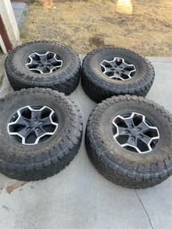 Jeep Wheels with Toyo Open Country M/T Tires