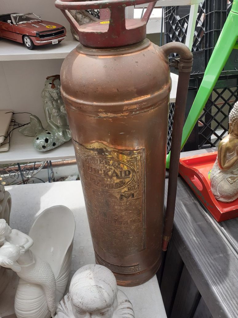 Antique copper fire extinguisher