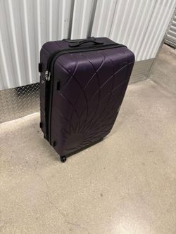 Large 30” high purple hard shell  Samsonite luggage on four wheels $50