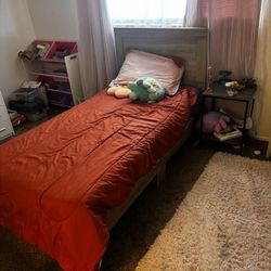 Twin size bed frame with mattress