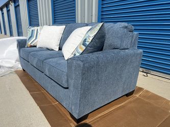 Brand New. Ashley Sofa. Blue. Only 1 Available. $449