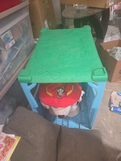 Electric ride on toy with house