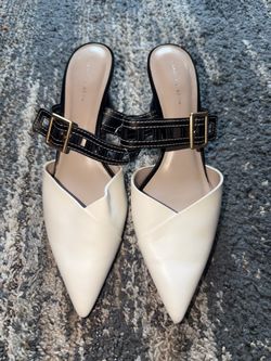 Size 41 cut-out strap high heeled mule pumps.