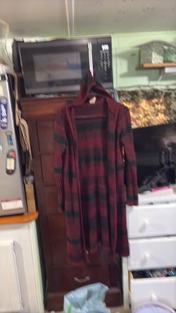 LOWERED AGAIN.     Woman’s long leave hooded sweater