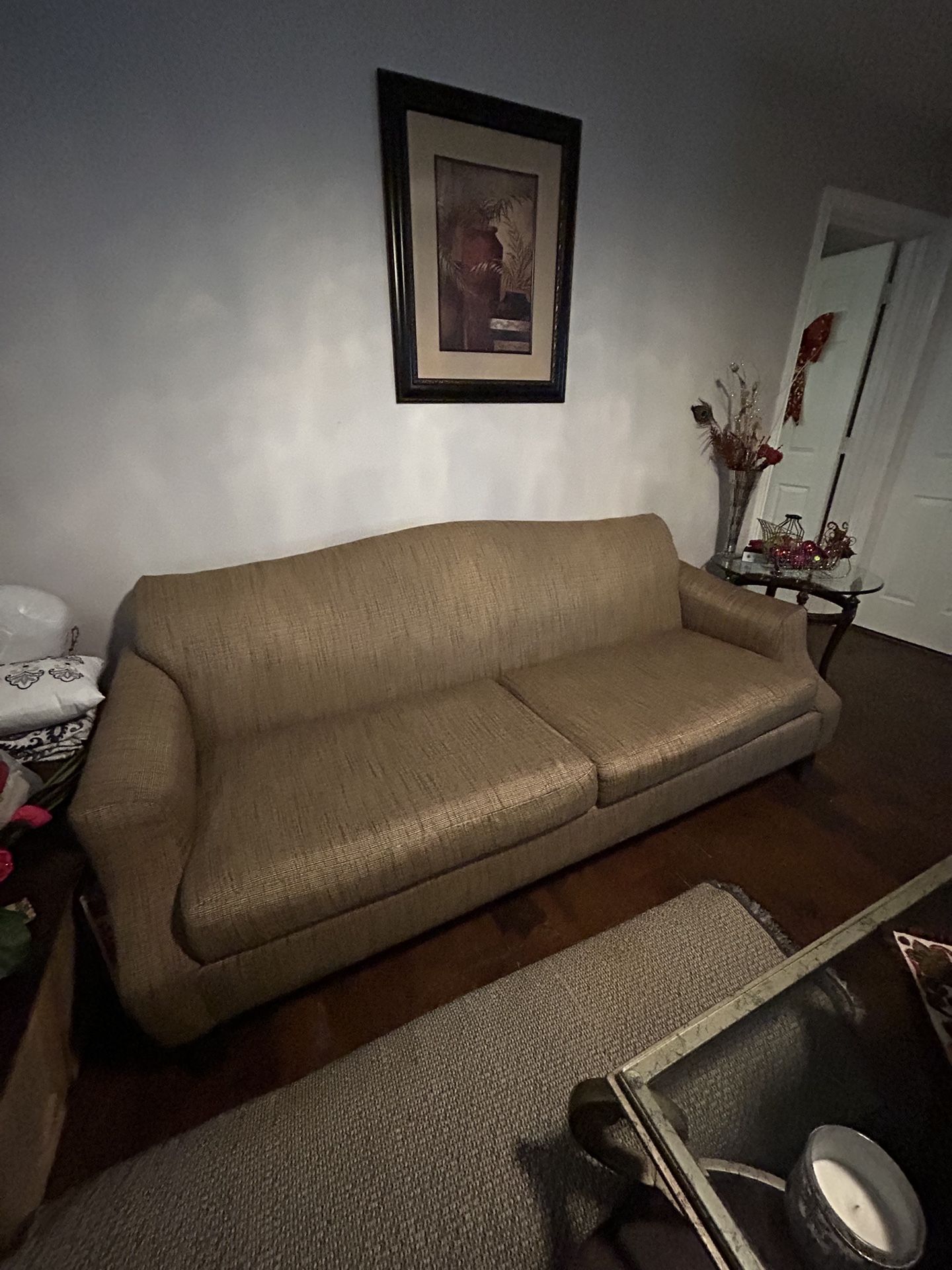 Comfortable brown sofa in good condition. 7’