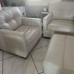 2 Ashleys’s Leather Sofas With Ottoman 