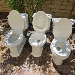 Kohler Toilet with attached Bidet and hose attachments