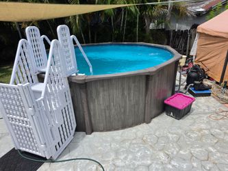 Sturdy heavy-duty above-ground pool, 15ft wide x 5ft deep, with durable plastic stairs — $1,200 or best offer!