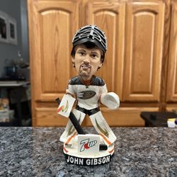 Anaheim Ducks Hockey John Gibson Bobblehead- Anaheim Ducks 2016.  Preowned no box.  Has been on display in a cabinet with an Anaheim Ducks collection.