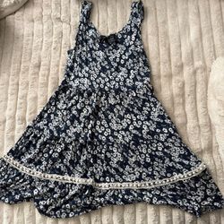 Navy blue floral mini dress with white lace trim