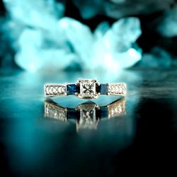 14kt White Gold with Princess Cut Center Diamond/ Two Blue Stones on Side and Small Round Diamonds Ring.