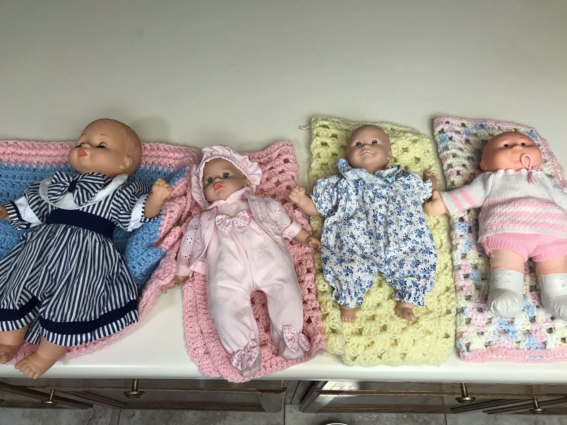 Classic Baby Dolls with knitted blankets
