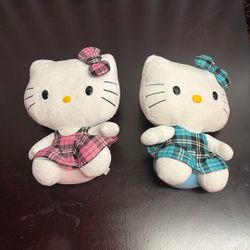 Two Hello kitty Stuffed Animals