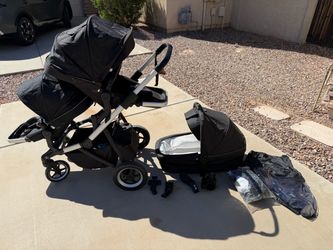 Thule double stroller with bassinet and accessories