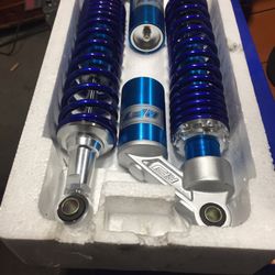 Aftermarket shocks for quad or motorcycle