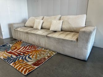 OFF WHITE BONELESS SOFA W/ FREE DELIVERY