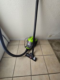 Bissell Canister vacumn with retractable cord.