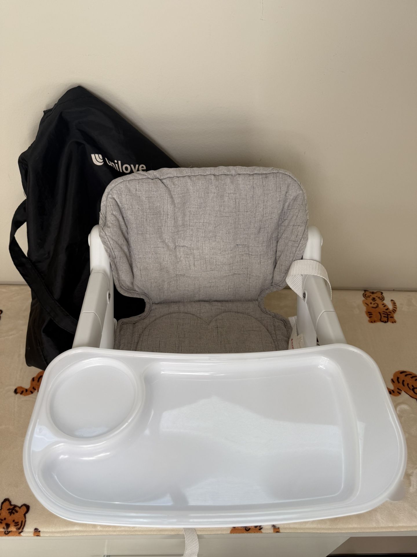 Unilove Feed Me 3 in 1 Dining Booster Seat.