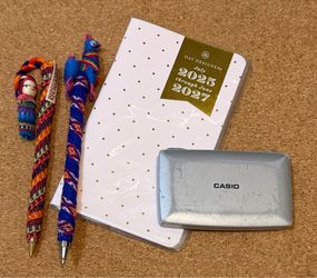 Planner, worry doll pen, Casio calculator bundle