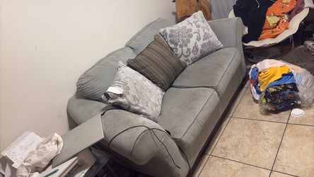 Couch and glass side table