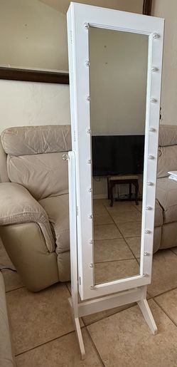 Standing white jewelry box with lights and lock