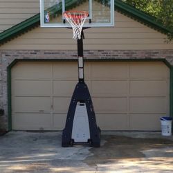 Spalding The Beast 60" Tempered Glass Portable Basketball Hoop 
