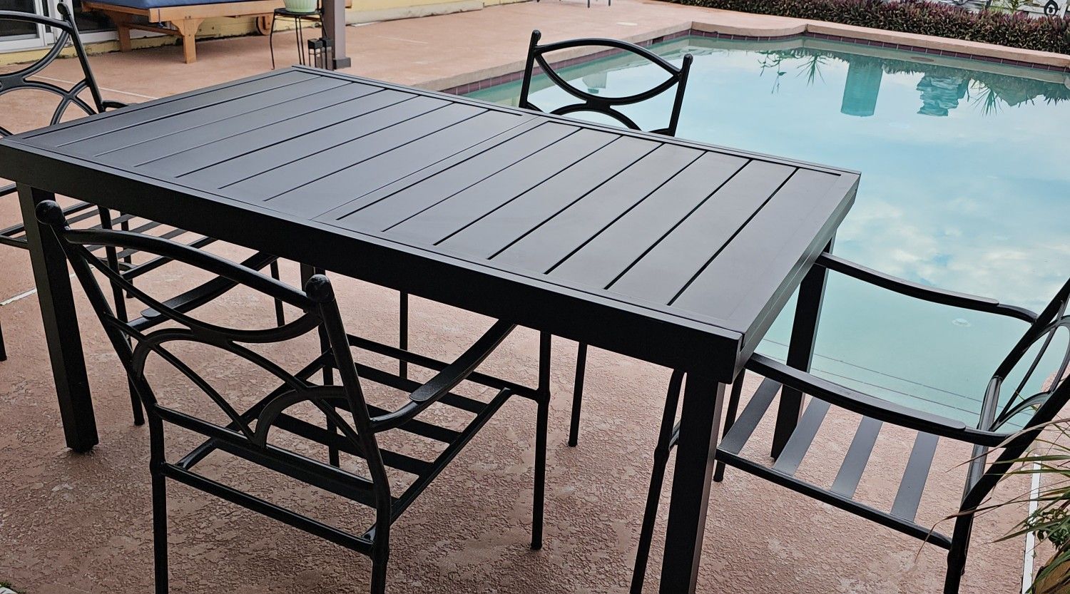 BLACK METAL PATIO FURNITURE SET.....EXPANDABLE TABLE AND 4 CHAIRS...NEW....$ 450