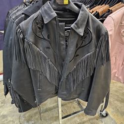 Vintage ladies Leather Jacket with rose detail & fringe. Removable thinsulate liner. Size 10 (medium)

$130 FIRM